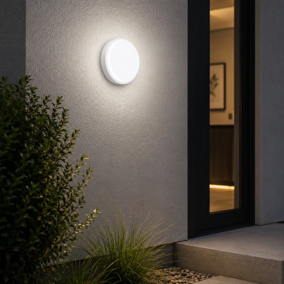 Hublot LED rond installé sur façade extérieure