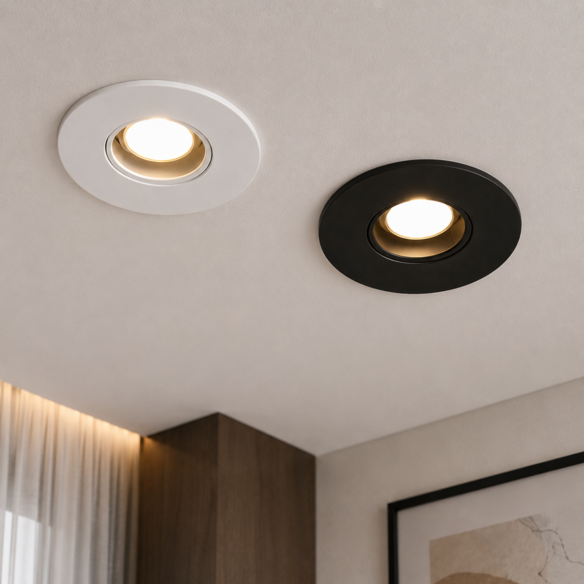Supports spots encastrables ronds blanc et noir installés au plafond