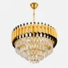 Lustre cristal rond doré et noir avec design luxe et pampilles en cristal