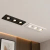 Support spot encastrable carré 3 trous blanc et noir installé au plafond