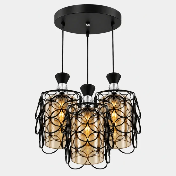 Suspension triple noire installée dans une salle à manger moderne avec lumière chaude
